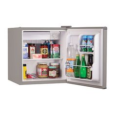 an open refrigerator filled with drinks and condiments on the inside, side by side