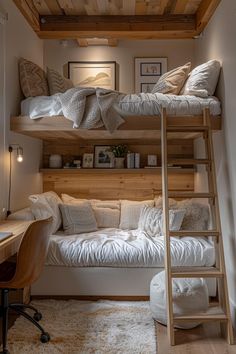 a loft bed with two sets of bunk beds and a ladder to the top level