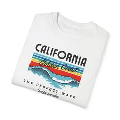 Capture the Spirit of the Golden State with Our California Vibes Graphic T-Shirt – Comfort and Style Combined! Celebrate the sunny vibes and laid-back lifestyle of California with our California Vibes graphic t-shirt. Crafted from the renowned Comfort Colors 1717 garment-dyed fabric, this tee offers unparalleled comfort and durability, making it a must-have addition to your wardrobe. Made from 100% ring-spun US cotton, this t-shirt features a soft-washed, garment-dyed fabric that feels incredibl White Crew Neck Top For Summer Adventures, White Crew Neck Top For Summer, White T-shirt With Text Print For Summer Adventures, White Crew Neck T-shirt For Summer Adventures, Casual Surfing T-shirt With Custom Print, White Pre-shrunk T-shirt For Surfing, White Graphic Print T-shirt For Summer Adventures, White Graphic Print T-shirt For Summer, White Surfing T-shirt With Text Print