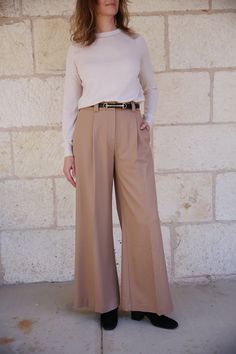 Our Tiffany Pant is a sophisticated addition to your wardrobe that redefines comfort and style. Crafted from our signature ultra-soft brushed twill fabric with a subtle stretch, these pants offer a luxurious feel against your skin and move effortlessly with your every step. The pleated front and wide-leg design add a touch of timeless elegance, making them suitable for both casual and formal occasions. An internal clasp at the front ensures a secure fit, while welt pockets at the back provide a Ag Jeans, Leg Design, Twill Fabric, Denim Pant, Ulla Johnson, Eileen Fisher, Skirt Pants, Welt Pockets, Formal Occasion