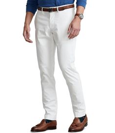 From Polo Ralph Lauren&#x2C; these pants feature:belt loopszip fly with a buttoned closuretwo front angled pocketsright hip coin pocketback left buttoned pocketback right button-and-loop pocketsignature embroidered pony above the back right pocketstretch fabriccotton/elastanemachine wash; tumble dryImported. Classic Slim Cotton Pants, White Slim Fit Dress Pants For Business Casual, White Slim Fit Bottoms For Business Casual, White Business Casual Bottoms With Belt Loops, White Bottoms With Belt Loops For Business Casual, Classic Slim Cotton Bottoms, Slim Fit Pants For Business Casual, Fitted White Chinos For Work, White Fitted Chinos For Work