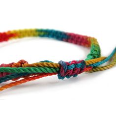 Nylon Adjustable Bracelet Handcrafted in Thailand Multicolor Adjustable Cord Friendship Jewelry, Multicolor Waxed Cord Friendship Bracelets As Gift, Multicolor Waxed Cord Friendship Bracelets, Adjustable Nylon Cord Braided Bracelets For Friendship, Friendship Braided Bracelets With Sliding Knot, Multicolor Sliding Knot Bracelet With Waxed Cord, Nylon Cord Braided Bracelets With Adjustable Length For Friendship, Multicolor Waxed Cord Bracelet With Sliding Knot, Adjustable Rainbow Friendship Bracelets With Sliding Knot