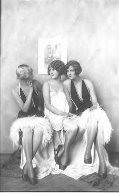 three women sitting next to each other with a quote on the wall above them that says, when someone shows you who they are, believe