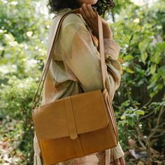 Crossbody Satchel in Camel Leather on model Tool Boxes, Crossbody Satchel, Recycled Leather, Leather Tooling, Easy Wear, The Spirit, Panel Siding, Full Grain Leather, Cleaning Clothes