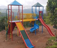 children's play area with slide and climbing frame