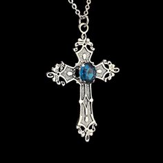 Blue Gothic Metal Necklace, Gothic Blue Metal Jewelry, Blue Gothic Metal Jewelry, Gothic Blue Jewelry For Gifts, Blue Gothic Jewelry For Gifts, Blue Gothic Jewelry For Gift, Gothic Cross Necklaces For Jewelry Making, Spiritual Blue Cross Pendant Necklace, Blue Crucifix Necklace For Spiritual Wear