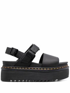 Black leather platform-sole sandals from DR. MARTENS featuring platform sole, buckle-fastening ankle strap, open toe and branded insole. | Dr. Martens Platform-Sole Sandals Doc Sandals, Doc Marten Platform, Platform Dr Martens, Dr Martens Voss, Dr Martens Sandals, Teva Flatform, Nike Shoes Women Fashion, Embellished Sandals, Designer Sandals