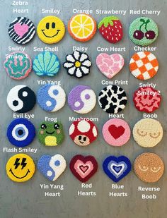 crocheted buttons with different embellishments and names on them, arranged in the shape of smiley faces