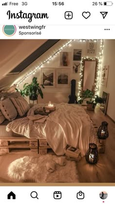 an instagram photo of a bedroom with lights on the wall and bed in it