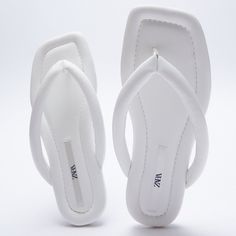 Zara Flat Quilted Sandals Slides Slippers Slip On White New Brand New Without A Box. Zara Toe Post Sandals For Summer, Chic Flat Flip Flops For Day Out, Chic White Flip Flops For Vacation, Chic Synthetic Toe Post Flip Flops, Chic White Sandals With Textured Footbed, White Single Toe Strap Flip Flops For Spring, Chic White Flip Flops For Spring, White Zara Sandals For Vacation, Zara White Leather Sandals