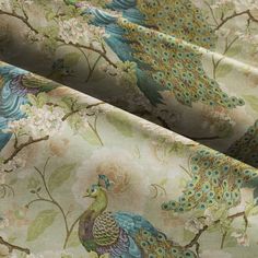 an image of peacocks and flowers printed on fabric