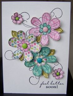 a handmade card with flowers on it