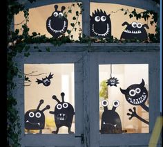 the door is decorated with cut out monsters