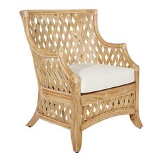 a wooden chair with white cushions on it