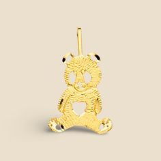 Discover the charm of our meticulously crafted Precious Handmade 14K Solid Gold Cute Panda Pendant. Hand-shaped with devotion and precision, this endearing Panda pendant embodies the essence of love and camaraderie, a testament to our commitment to spreading joy through exquisite craftsmanship. Crafted in our esteemed Los Angeles workshop, this charming Panda pendant is sculpted from the finest 14K gold, ensuring not just a beautiful accessory, but a symbol of enduring quality and elegance. Each order is meticulously prepared with complete packaging, including a sleek box to enhance your unboxing experience. To complement this adorable piece, we offer a selection of solid gold chains as options. Specifications: - Material: 14K Solid Gold - Weight: Approximately 0.7 grams - Height: 18mm - W Gold Pendant For Valentine's Day, Valentine's Day Gold Cat Design Jewelry, Panda Pendant, Valentine's Day Yellow Gold Pendant Charms, Tiger Gold Pendant, Unboxing Experience, Panda Love, Solid Gold Chains, Gold Piece