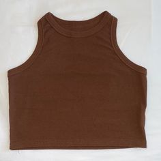 Great Condition, Never Worn Sleeveless Knit Tops In Solid Color, Trendy Solid Brown Tops, Fitted Brown Solid Color Top, Fitted Solid Brown Tops, Brown Crew Neck Tank Top For Fall, Plain Brown Summer Tops, Brown Knit Crew Neck Top, Casual Brown Crew Neck Knit Top, Casual Brown Sleeveless Crop Top