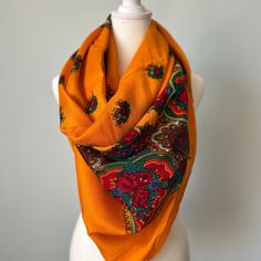 Traditional Floral Scarf is a perfect accessory for any season. The fabric has a soft feel to keep you warm and cosy. Fabric: Cotton Measurements: 46 inches x 46 inches Care: only cold wash with identical colors, do not bleach, If you have any questions please feel free to contact us. Thanks for visiting our shop. Orange Bohemian Shawl For Fall, Bohemian Patterned Scarves For Fall, Yellow Bohemian Shawl Silk Scarf, Yellow Bohemian Silk Shawl Scarf, Bohemian Yellow Silk Shawl Scarf, Traditional One-size Headscarf For Festivals, Bohemian Winter Scarves For Festive Occasions, Bohemian Winter Festive Scarves, Traditional One-size Festival Headscarf