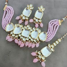 Gold Rodium Polish Pink and Majenta color Necklace in Metal Alloy studded with Kundan, Pearl Luxury Kundan Necklace With Dangling Beads For Celebrations, Luxury Kundan Necklace With Gold Beads For Festivals, Luxury Pink Kundan Necklaces, Maroon Necklace, Gray Necklace, Yellow Necklace, Color Necklace, Metal Necklace, White Necklace