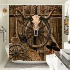 a bathroom with a cow skull on the wall