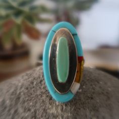 Beautiful multicolored Turquoise and Sterling Silver Ring! Totally unique. Handcrafted Native American Jewelry. Perfect pinky ring! Handmade Artisan Multicolor Turquoise Ring, Handmade Multicolor Artisan Turquoise Ring, Artisan Oval Multi-stone Turquoise Ring, Oval Turquoise Inlay Rings, Oval Turquoise Rings With Inlay, Multicolor Collectible Ring Jewelry, Multicolor Handmade Open Ring, Turquoise Multi-stone Ring For Gift, Oval Turquoise Multi-stone Ring