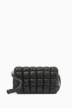 This innovative piece marries two signatures from the COS accessories collection: quilted textures and crossbody shapes. Offered in an enduring black hue, it's crafted from supple nappa leather in the signature pillowy texture and is perfectly sized to hold your phone, wallet and then some. Wear it on your shoulder, across the body or detach the strap entirely to style it as a clutch. Magnetic flap closureDetachable adjustable shoulder strapCOS supports responsible manufacturing via the Leather Black Quilted Leather Bag, Modern Black Quilted Shoulder Bag, Formal Quilted Leather Shoulder Bag, Signature Quilts, Mens Holiday, Quilted Crossbody Bag, Women Accessories Bags, Quilted Bag, Black Cross Body Bag