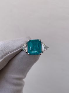 Paraiba Tourmaline Ring, Paraiba Engagement Ring, 925 Sterling Silver, Anniversary Ring, Wedding Ring, Bridal Vintage Ring, Gift For Women Handmade ring. Stone : Lab Paraiba  Gemstone Cut : Octagon Cut Stone Size : 8mm×10mm Side Stone : Cubic Zirconia Metal  : 925 Sterling Silver Plating:  Platinum Plated , Rose Gold Plated , Gold Plated. Personalization:10K/14K/24K/GOLD/SILVER/PLATINUM/ROSE-GOLD/WHITE GOLD. (Contact me)  All items come in a beautiful jewelry box.  Since all out Jewelry is Handm Gia Certified Fine Jewelry Gemstones For Wedding, Wedding Emerald Gemstone With Accent Stones, Luxury Multi-stone Topaz Engagement Ring, Gia Certified Emerald Gemstones For Wedding, Gia Certified Trillion Cut Emerald Ring For Anniversary, Gia Certified Round Cut Gemstones For Wedding, Gia Certified Trillion Cut Emerald Wedding Ring, Emerald Cut Sterling Silver Gemstones For Wedding, Gia Certified Silver Topaz Ring For Wedding