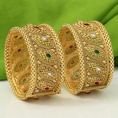 Ashura jewels beautiful wedding wear Polki Multi Beads bangle set this is a 2 pcs Kada bracelet gold polished bangle set this set is very easy to wear. we ship our items everywhere. Colour Red Green design bangle stone Pearl beads  2.4,2.6, Size available These openable bangles can be wear by 2.8 size person.   material gold plated Standard shipping takes 3 to 4 weeks to deliver the parcel if a customer needs an item urgently then we can ship the item through Express shipping it takes 3 to 6 day Gold Kada Design For Women, Red And White Saree, Heavy Earrings, Chandbali Earrings, Bangle Bracelet Set, Traditional Earrings, Bead Bangles, Indian Earrings, Bangle Set