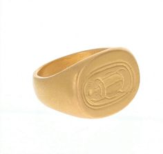 22K GOLD OVAL ENGRAVED SCARAB SIGNET RING • DESIGNED AND HAND FORGED IN NEW YORK • SIZE: 8 Please email info@elihalili.com or call the studio at 212-941-7979 for any inquiries. Traditional Gold Oval Engraved Ring, Traditional Gold Oval Signet Ring, Traditional Oval Yellow Gold Signet Ring, Ceremonial Gold Oval Signet Ring, Ceremonial Oval Gold Signet Ring, Gold Oval Engraved Ring For Ceremonial Occasions, Handmade Oval Yellow Gold Engraved Ring, Traditional Handmade Gold Signet Ring, Wax Ring