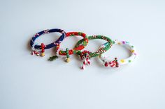 These beautiful beaded bracelets are perfect for celebrating the winter in style! These festive bracelets are available in 4 different colors: Dark Blue, Red, Green, and White. Our seed beads are of the highest quality and add a beautiful sparkle to our bracelets. These festive bracelets make great gifts for friends and family. They're a unique and thoughtful gift that will be sure to please. These bracelets are also perfect for all occasions! 🪡 PRODUCT DETAILS: * Standard size that fits all * Multicolor Beaded Bracelets For Holiday, Christmas Colorful Beads Bracelets, Christmas Multicolor Beaded Bracelets, Beaded Bracelets For Christmas Party, Christmas Bracelets With Colorful Beads, Handmade Multicolor Bracelets For Holidays, Handmade Festive Beaded Bracelets For Holidays, Handmade Beaded Bracelets For Holiday Festivities, Handmade Beaded Bracelets For Holiday Festive Occasions