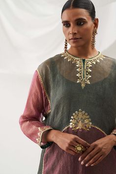 Editor's Note Elevate your style with our free-style kurta, featuring intricate gota patti embroidery on the neckline, bodice, and sleeve's hem. This effortlessly chic kurta is perfectly paired with comfortable culotte pants, making it a delightful choice for both casual outings and more formal settings. Fabric: Tissue and crepe Color: Pink Component: Kurta, pants and slip Occasion: Festive Note: Product colour may slightly vary due to photographic lighting sources Care: Dry clean only About the Gota Patti Embroidery, Kurta And Pants, Design Kurti, Gold Suit, Pink Kurta, Lehenga Blouse Designs, Designer Kurti Patterns, Classy Outfits For Women, Iranian Women Fashion