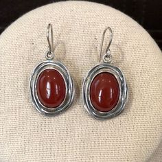 Sterling Silver Edged Carnelian Drop Dangle Earrings Shabool Didae Sterling Silver Drop Earrings Oval Carnelian Cabochon Measures Approximately: 13/4” Long X 5/8” Wide French Wire Hook Condition: Nwot, New Without Tags Ask Questions And/Or Request Additional Photos, Measurements As Needed Color May Vary Based On Shadows, Lighting, Monitor, Display Settings $168 En Route Jewelry Earrings, Elegant Carnelian Earrings, Elegant Silver Carnelian Earrings, Silversmithing Jewelry, Vintage Silver Earrings, Vintage Silver Jewelry, Bezel Earrings, Diy Jewelry Unique, Indie Jewelry