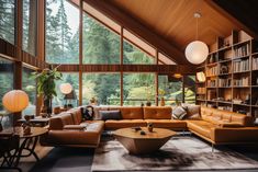 a living room filled with lots of furniture and bookshelves in front of large windows