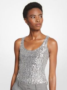 This sequined bodysuit will command attention whenever you slip it on. Made in Italy from stretch tulle, it features a seamless stretch-jersey base that disappears under tailoring and denim alike. Keep accessories pared back to let it fully shine. Stretch Scoop Neck Bodysuit For Parties, Glamorous Fitted Sequin Tank Top, Fitted Tank Top With Contrast Sequin For Night Out, Glamorous Fitted Tank Top For Party Season, Fitted Sequin Tank Top For Night Out, Chic Fitted Sequin Tank Top, Glamorous Fitted Evening Tank Top, Stretch Embellished Tank Top For Party, Party Stretch Embellished Tank Top