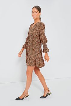 Meet one of our favorite silhouettes, the Kenzo Dress. Featuring feminine flutter smocked cuffs, a V-neckline, and a loose empire waist, this is the most flattering flirty frock! Pair this leopard mini with flats for a casual look or dress up with heels and statement earrings for date night. V-neckline Long sleeves Elasticated ruffle cuff Loose empire waist Tiered skirt Swing shape Mini length Crepe fabric Material: 100% Polyester Care: Machine wash cold Kenzo Dress, Cotton Poplin Fabric, Tier Skirt, Crepe Fabric, Tiered Skirt, Poplin Fabric, Cotton Poplin, Empire Waist, Fabric Material