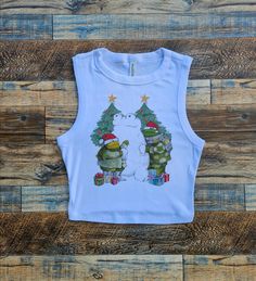 Frog Christmas Santa crop tank and baby tee  Women's Christmas crop top. Lightweight and breezy, perfect! Holiday Sleeveless Cotton Top, Christmas Crop Top, Frog Christmas, Christmas Tree And Santa, Black Christmas, Christmas Women, Christmas Baby, Christmas Santa, Baby Tee