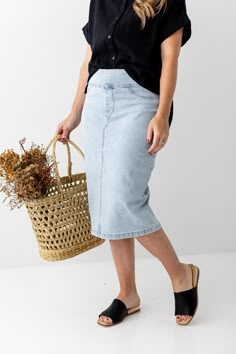 This soft denim skirt has a vintage wash for that lived in look we love! It is made from a quality, stretch denim to ensure a modest and flattering fit. Featuring a wide waistband for extra comfort and easy styling. This skirt was designed with everyday wear in mind and will pair well with just about any casual top in your wardrobe. Exclusively designed by us for you! 97% Cotton 3% Spandex Machine Wash Cold Gentle Cycle Do Not Bleach Hang to Dry Low Iron FINAL SALE: NOT ELIGIBLE FOR RETURN OR EX Knee Length Denim Skirt, Denim Skirts Knee Length, Modesty Outfits, Apostolic Fashion, Denim Skirt Outfits, Modest Skirts, Wardrobe Edit, Denim Skirts, Nice Style