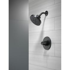 an image of a shower faucet with thermostaer