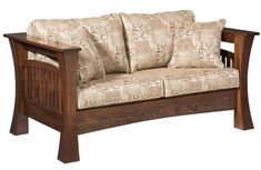 a wooden couch with four pillows on it's back and arm rests against a white background