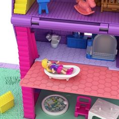 there is a doll house with furniture and accessories