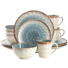 a set of blue and white dishes