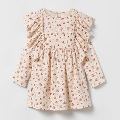 Brand New Zara Baby Floral Dress. Size 9-12m. Cute Long Sleeve Dresses With Ruffles, Cute Long Sleeve Dress With Ruffles, Spring Ruffle Dress For Playdate, Playful Ruffled Dresses For Fall, Ruffled Dresses For Playtime In Fall, Cute Fall Dresses With Ruffle Hem, Fall Dresses With Ruffles For Playtime, Fall Cotton Dress With Ruffle Sleeves, Cute Cream Fall Dress