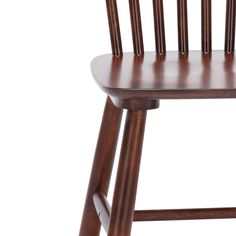 a wooden chair with four chairs on the back and one in the front, against a white background