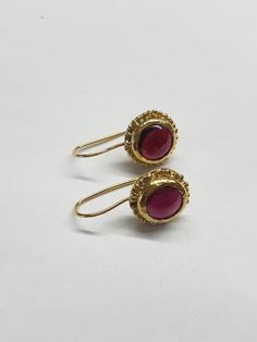 Garnet earrings, solid gold garnet earrings, gold drop earrings, antique earrings, January birthstone earrings, 14k gold earrings These gold Garnet earrings were 100% handmade from start to finish The red garnet cabochon stones are beautiful and shine with a deep red color. The 14k gold earrings are beautiful and glamorous - you will not want to take them off. They are perfect for work and evenings and most suitable for brides. Dimensions: The earrings drop length is 1 inch (2.5 cm) The earrings Drop Gold Earrings, Earrings Antique, Coin Earrings, Birthstone Earrings, Garnet Pendant, Red Gemstones, January Birthstone, Garnet Earrings, Earrings Red