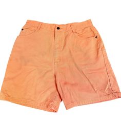 "These vintage 80s orange shorts are fashioned of a pastel orange cotton denim. The 90s denim shorts have a high waist with a front button and zip closure. The Condition is very good! The shorts have some light dirt marks on the front. The marked brand is \"St. Johns Bay\" and the marked size is 14. These would probably best fit a size Large. Please measure yourself before buying if you plan on wearing it.  MEASUREMENTS: (Measurements are taken of the garment laying flat, doubled,not stretched) Neon Retro, Orange Jeans, High Waisted Denim Shorts, Pastel Orange, 90s Denim, Orange Shorts, St Johns, Mom Shorts, High Waisted Shorts Denim