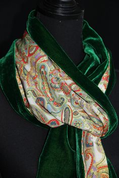 "Very soft in touch and luxurious double sided scarf made with silk velvet (30%silk, 70% viscose) in plain emerald green one side and 100% high quality pure silk satin, with colour matching, classic abstract pattern on the other side. Both shorter edges of the scarf are decorated with  single row of tiny green/yellow beads. The scarf has got a generous size and can be worn in several different ways. It drapes beautifully, the velvet side plays with both natural and artificial light. And it will Green Silk Scarf For Formal Occasions, Elegant Green Silk Scarf, Elegant Green Scarf For Formal Occasions, Formal Green Silk Scarf, Green Silk Scarf For Party, Green Silk Scarves For Formal Occasions, Formal Green Silk Scarves, Green Silk Shawl Scarf, Elegant Green Scarves For Party