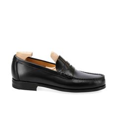 PENNY LOAFERS IN BLACK VARIK Timeless Black Slip-on Loafers, Classic Loafers With Reinforced Heel And Round Toe, Black Almond Toe Loafers With Leather Sole, Closed Toe Loafers With Branded Insole For Galas, Black Plain Toe Modern Moccasins, Black Modern Plain Toe Moccasins, Modern Black Plain Toe Moccasins, Black Loafers With Reinforced Heel For Business, Black Business Loafers With Reinforced Heel