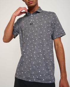 No matter what you shot, wearing this polo will cause something similar to a block party on the 18th green. Casual Black Polo Shirt For Golf, Casual Fitted Golf Tops, Collared Golf Tops For Summer, Cotton Golf Tops, Graphic Print Tops For Golf In Summer, Summer Golf Polo Top, Summer Golf Polo Collar Top, Fitted Graphic Print Polo Shirt For Golf, Casual Golf Polo Shirt With Graphic Print