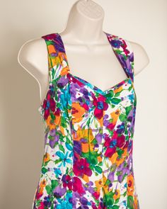 Vintage womens colorful flower pattern dress. BRIANNA size - 8 Vintage pre-owned. I see where the straps have been sewn to make slightly shorter, I will leave them that way, but it could be easily let back out Multicolor Floral Dress With Square Neck For Summer, Summer Floral Dress With Vibrant Print, Fitted Floral Dress With Vibrant Print For Summer, Multicolor Sleeveless Floral Dress With Vibrant Print, Fitted Multicolor Floral Print Sundress, Multicolor Floral Print Dresses With Square Neck, Multicolor Square Neck Floral Dress, Fitted Multicolor Floral Dress With Vibrant Print, Fitted Sundress With Vibrant Print For Spring