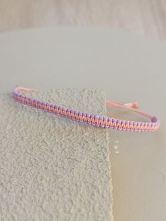 Pink Braided Friendship Bracelets Gift, Pink Braided Friendship Bracelet Gift, Adjustable Pink Braided Friendship Bracelets, Handmade Pink Nylon Cord Friendship Bracelets, Pink Macrame Braided Bracelet For The Beach, Handmade Pink Braided Nylon Cord Bracelet, Pink Macrame Bracelets For The Beach, Handmade Friendship Bracelets With Nylon Cord For Beach, Handmade Nylon Cord Friendship Bracelets For Beach