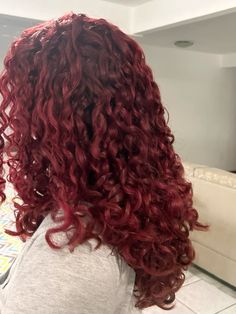 Red Curly Hair Outfits, Cherry Red Dyed Hair, Long Red Hair Curly, Red Hair Color On Curly Hair, Red Curly Hair Ideas, Red Curly Highlights, Curly Hair With Red Streaks, Red Wine Curly Hair, Red Hair On Curly Hair